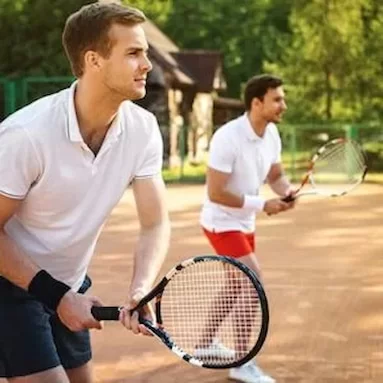 two men playing tennis