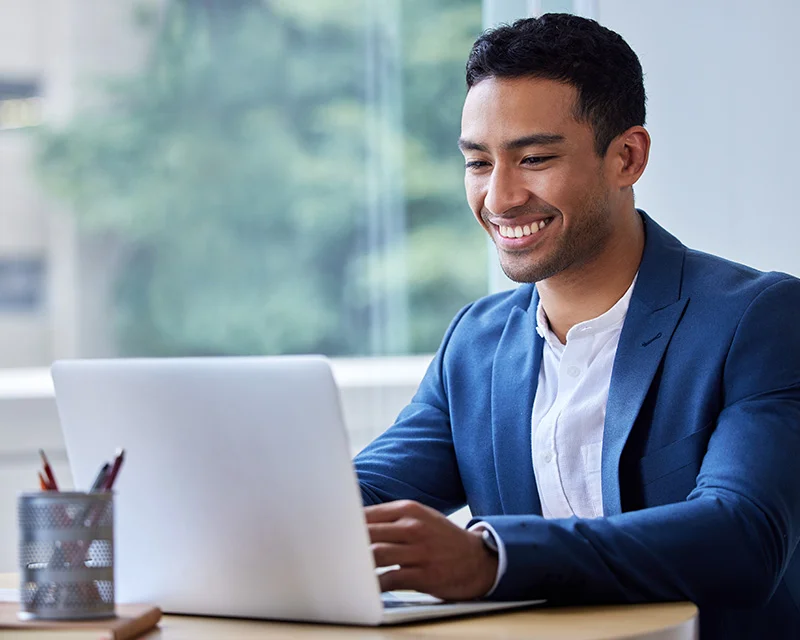 Man looking at a computer screen for supervision and consultation